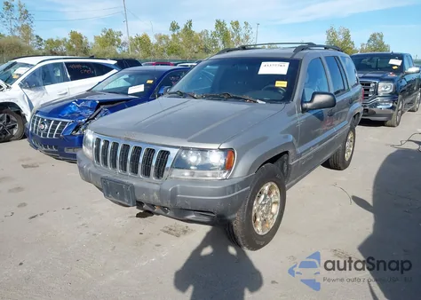 2001 Jeep Grand Cherokee Laredo из США, поврежденный, VIN 1J4GW48N01C587010